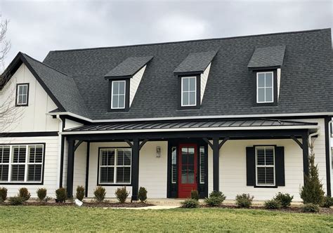 wbrick house metal roof|black shingles on brick house.